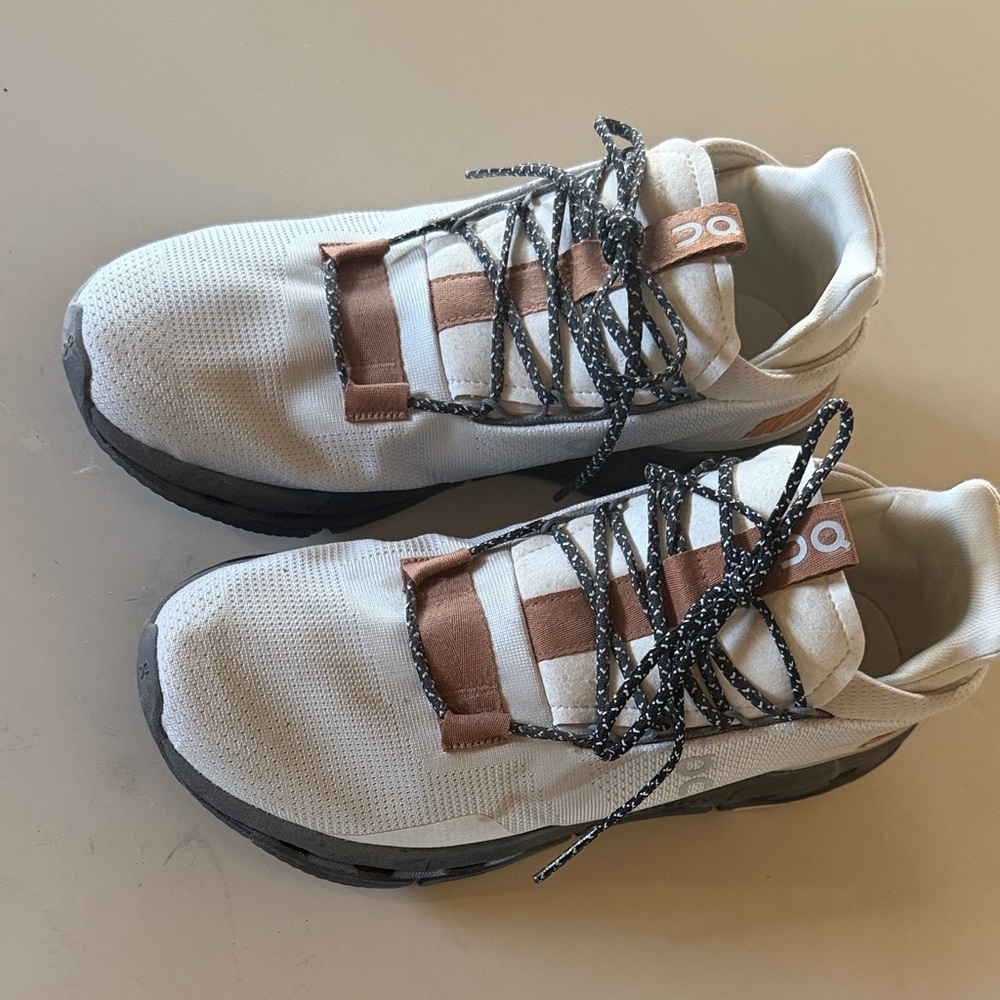 On Running White and Brown Sneakers